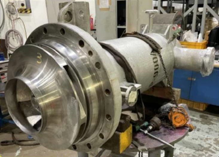 Canned motor pump rotor assembly on the workshop bench