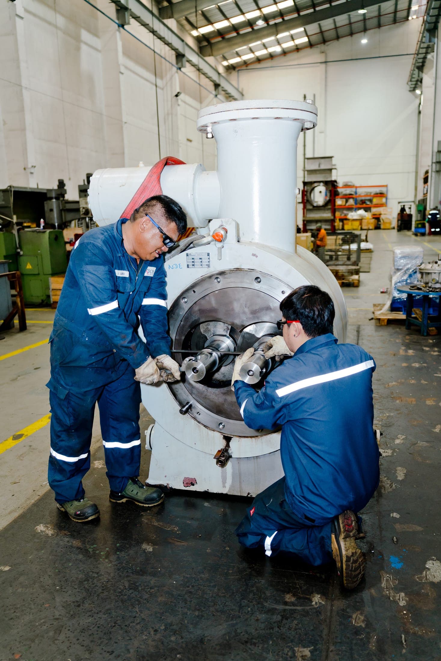 Exion technicians overhauling a large pump casing