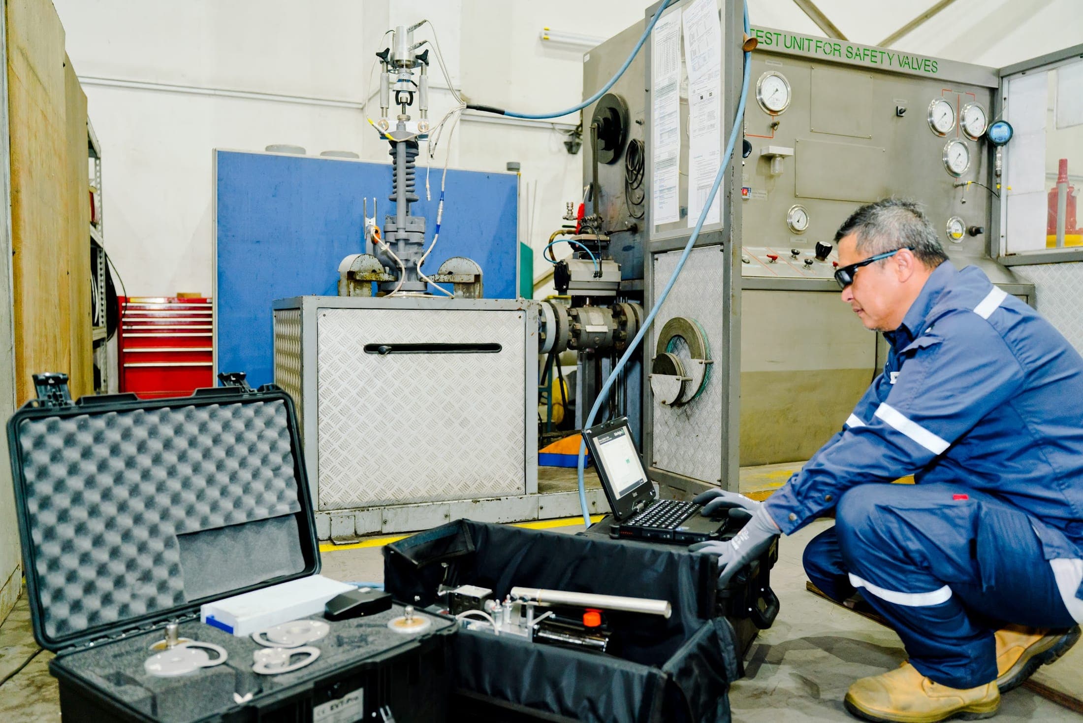 Engineer running diagnostics at the Exion safety valve test unit